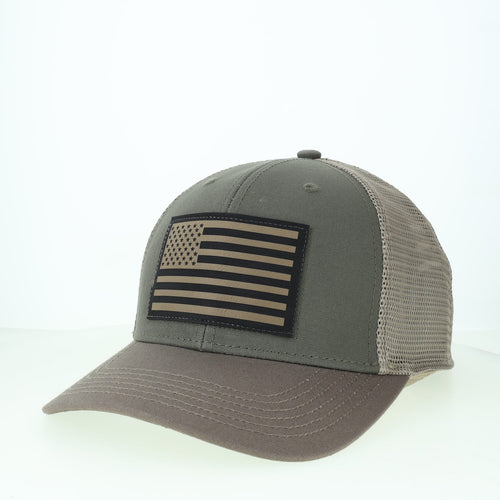 Olive cap with leather American flag patch on an olive background